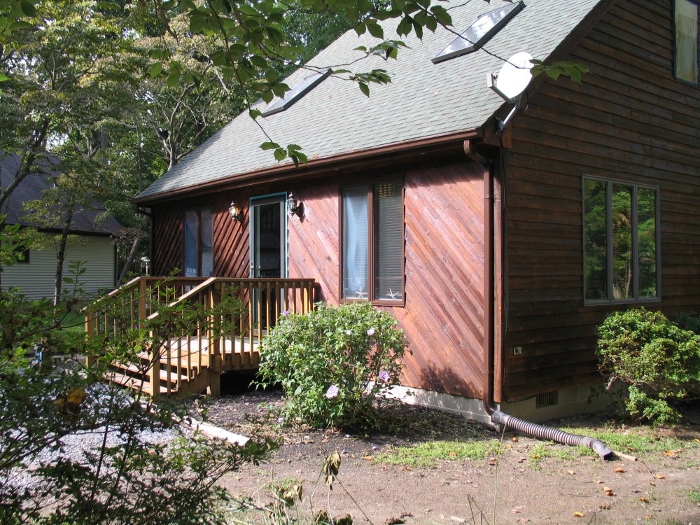 Front door of the cedar saltbox home in Lewes, Delaware cc